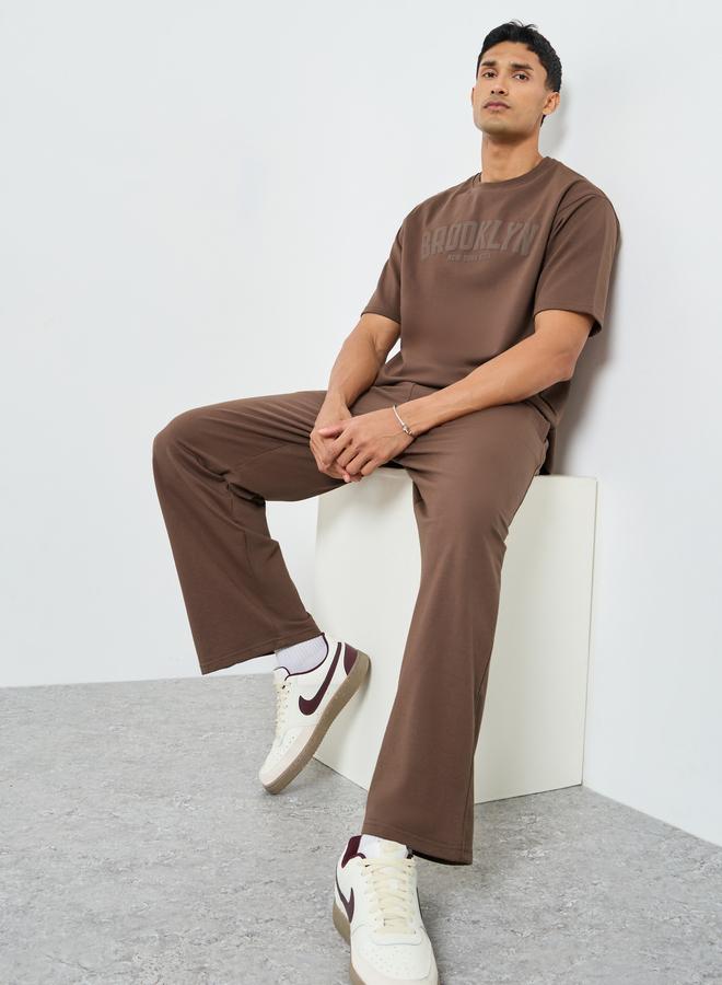 Styli Men Oversized Puff Print T-Shirt and Pants Co-Ords - Image 1